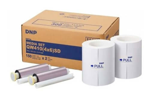 DNP QW410 printer media set with two rolls of paper and two ink ribbons for high-quality photo printing.