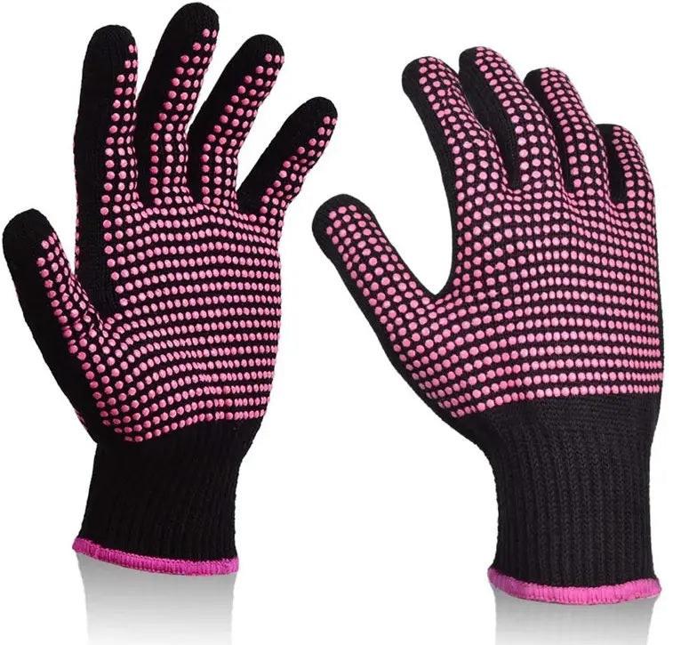 Pair of black and pink heat-resistant gloves for sublimation with textured palm on a white background