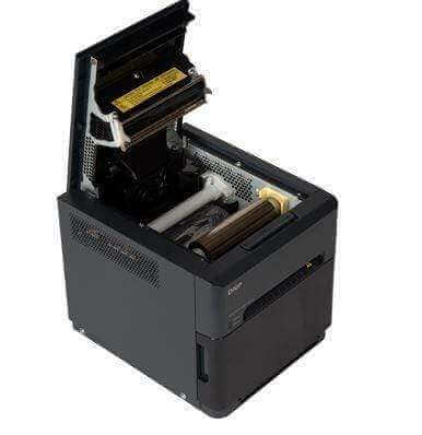DNP QW410 Photo Printer with open lid, showcasing its compact design and internal components.