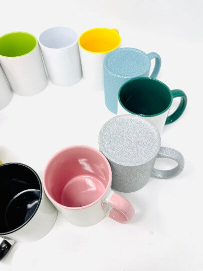 Colorful 12 pack of fun sublimation mugs in various colors and finishes displaying creativity and style.